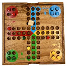 Wooden Ludo board game with colored pieces on a white background