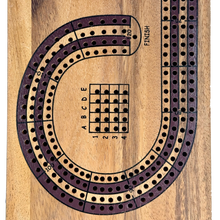Wooden cribbage board with multiple tracks and a scoring grid.