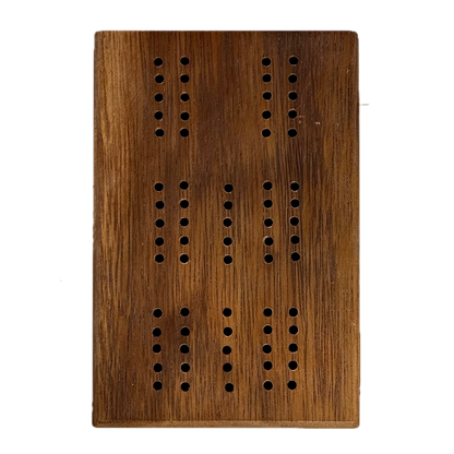 Wooden Cribbage board with holes on a white background