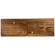 Pair of wooden cribbage boards with pegs on a white background