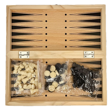 Wooden backgammon set with pieces in clear bags on a white background