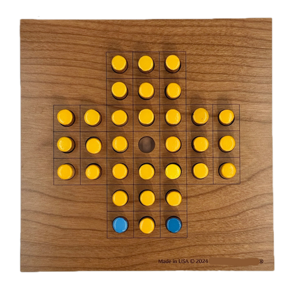 Wooden Solitaire game board with yellow and blue pieces 