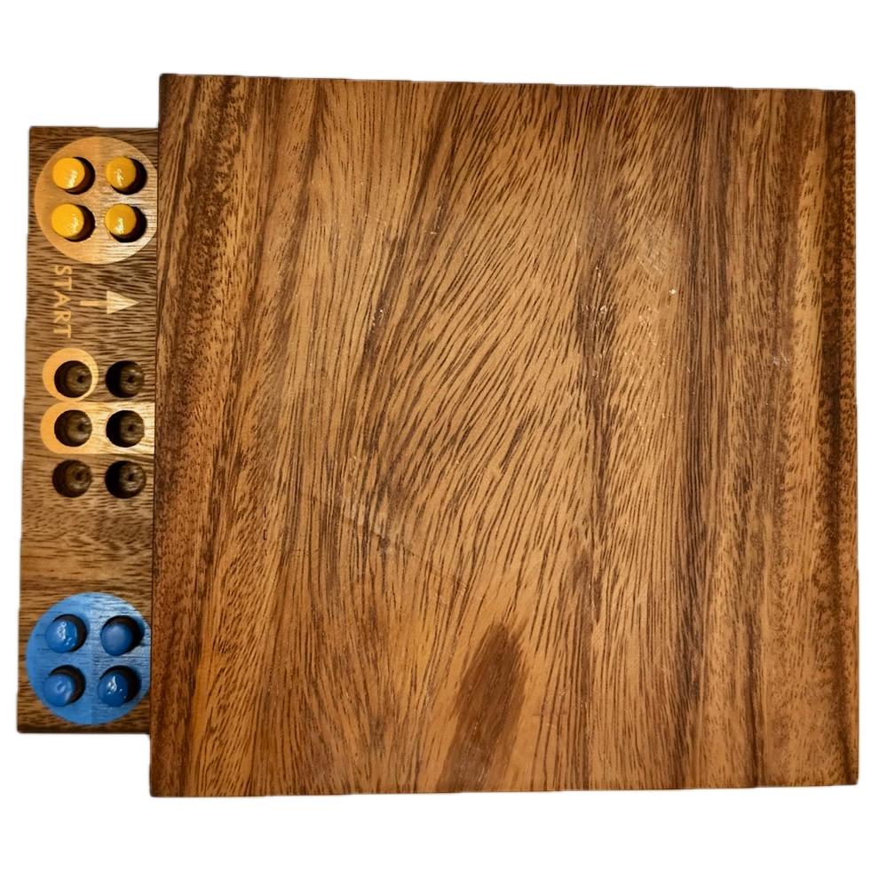 Wooden Ludo board game with colorful pieces on a white background