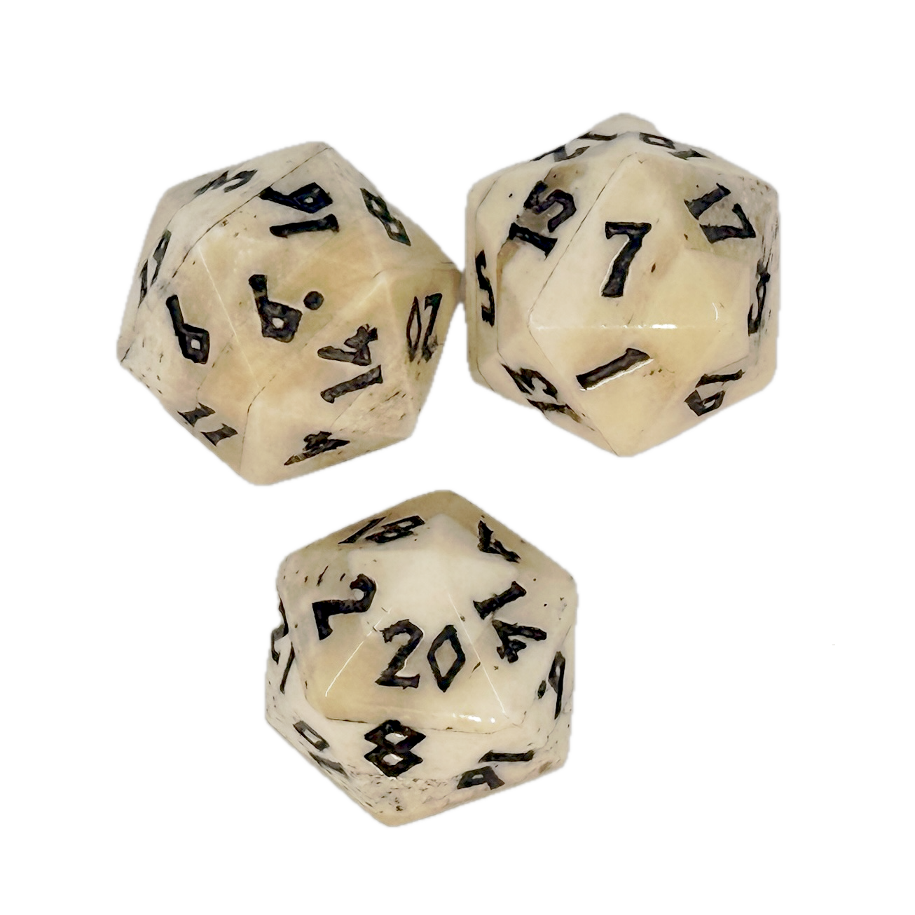 Three white polyhedral dice with black numbers on a white background