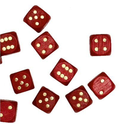 Red wood dice with gold dots on a white background