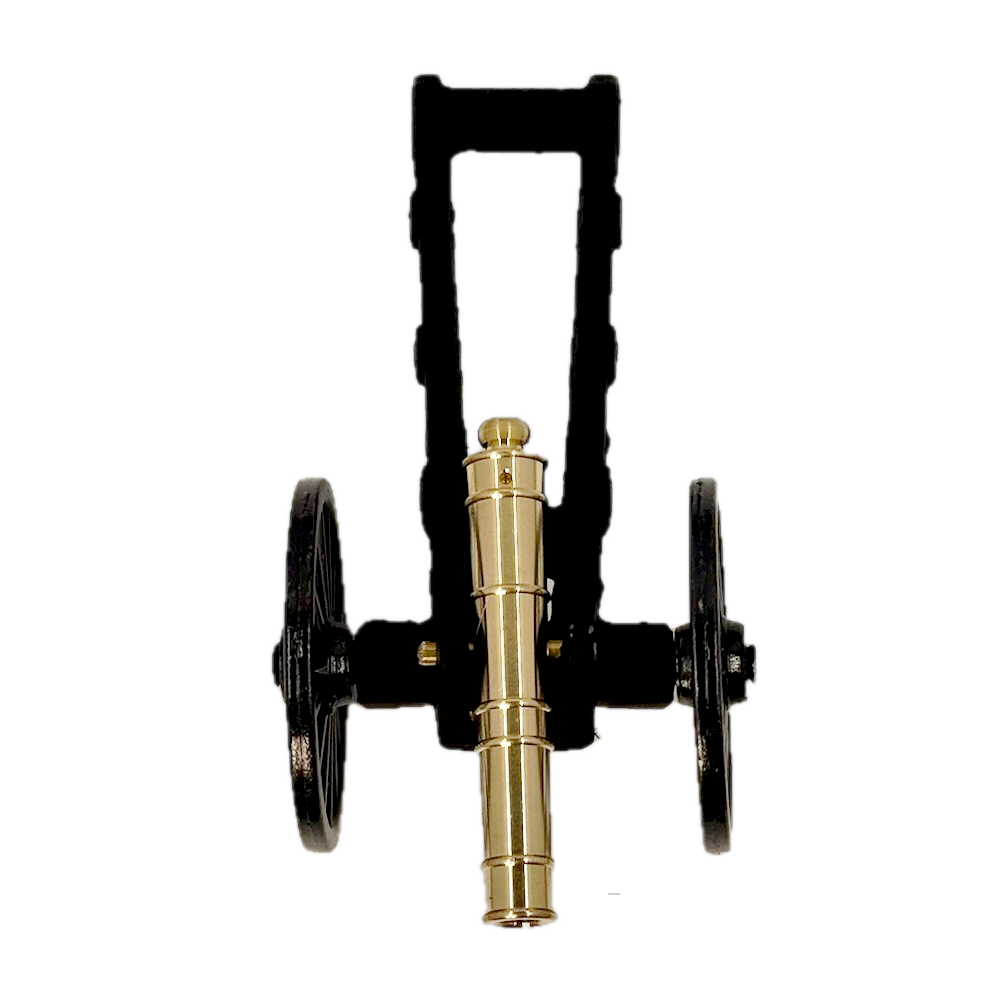 Brass replica Trail Cannon toy on a white background