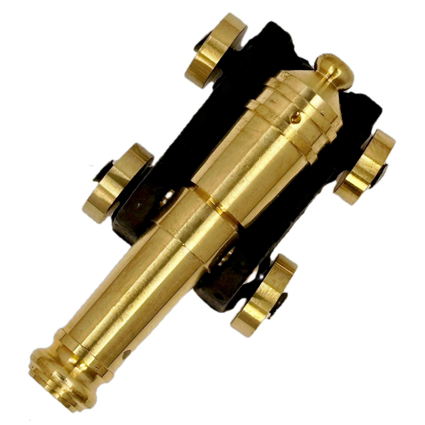 Brass replica ship cannon on a white background