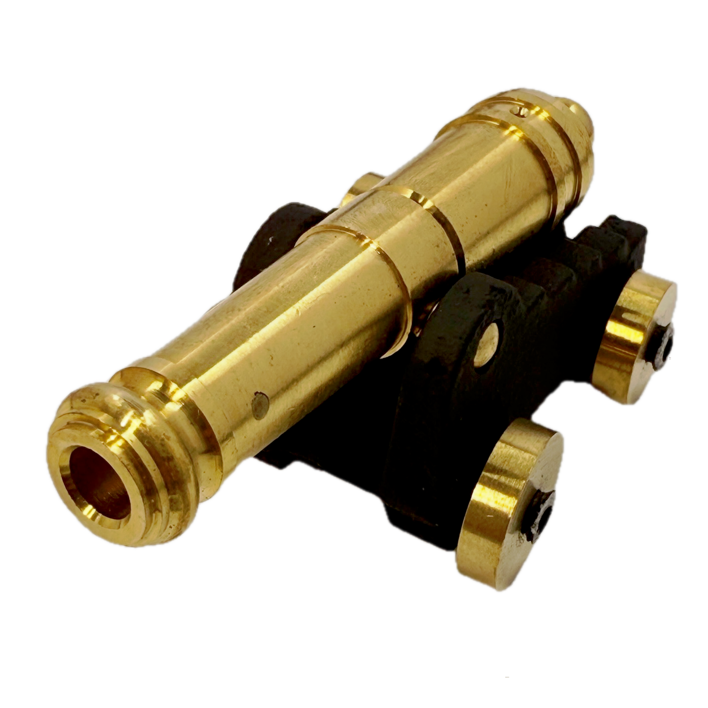 Brass replica ship cannon on a white background