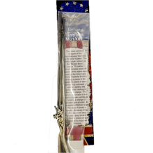 Packaged historical toy musket with detailed text on the packaging.