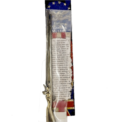 Packaged historical toy musket with detailed text on the packaging.