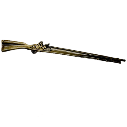 Decorative replica pewter cast musket on a white background