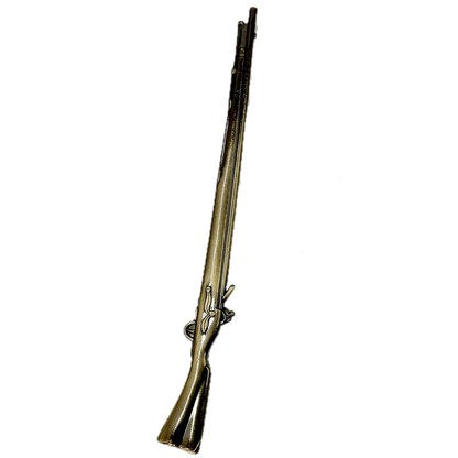 Decorative replica pewter cast musket on a white background