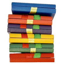 Colorful Jacob's Ladder toy on a white background