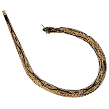 Wooden snake toy on a white background