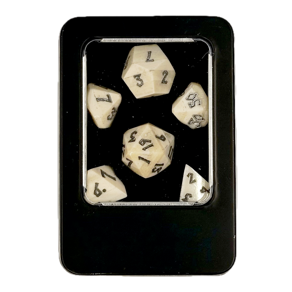 Set of six polyhedral bone dice with numbers in a black box