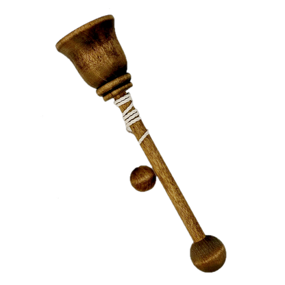 Wooden cup and ball toy on a white background