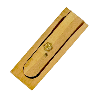 Small wooden Snake in the Box toy on a white background