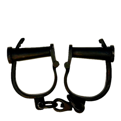 Black iron shackles on a white background