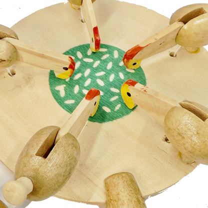 Wooden Feeding Chickens toy on a white background