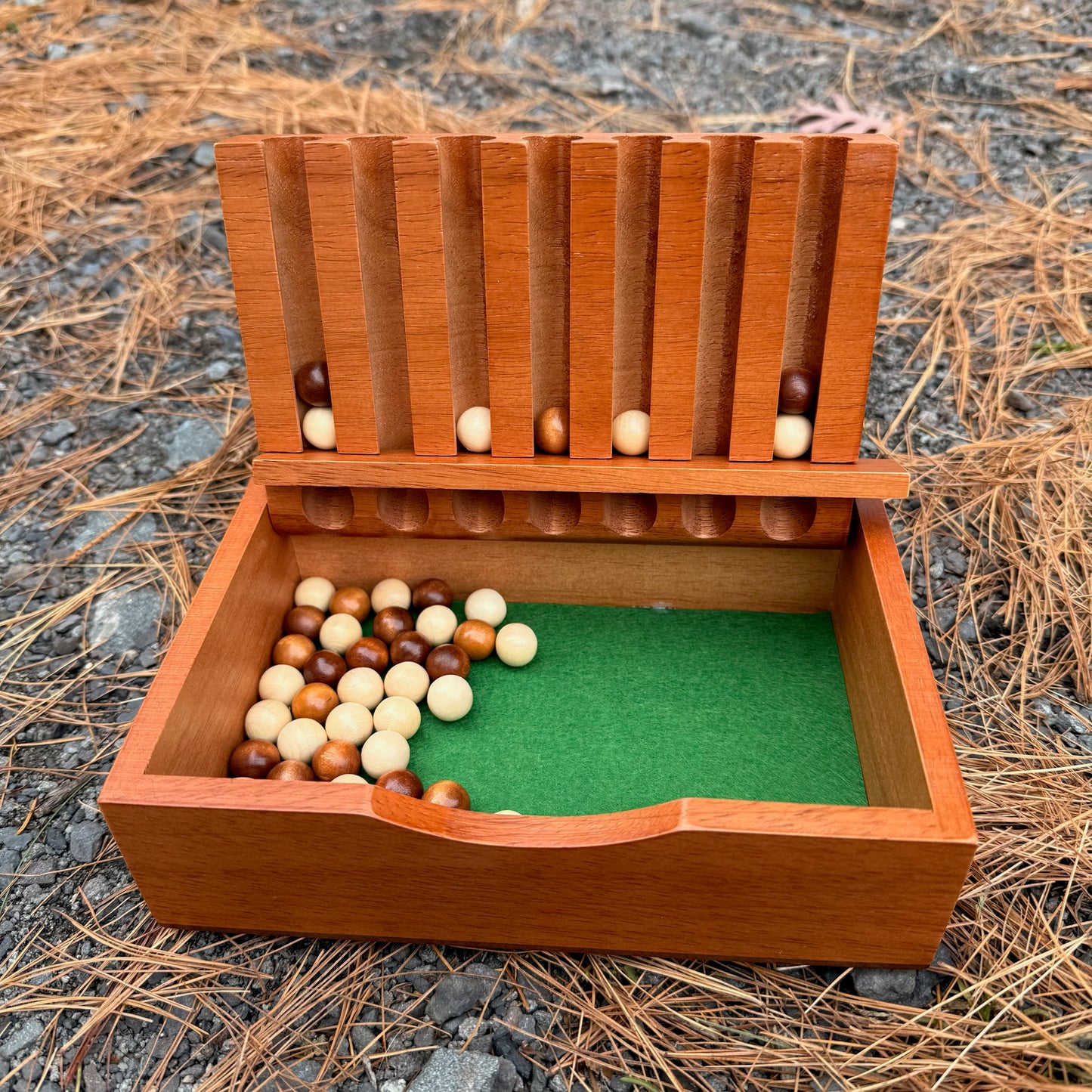 Wooden Captain's Mistress game on a natural background