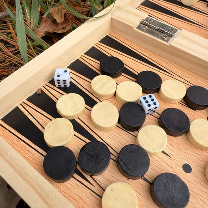 Wooden Backgammon board with pieces and dice 